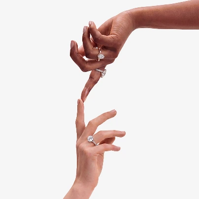 Minimal diamond ring hands editorial